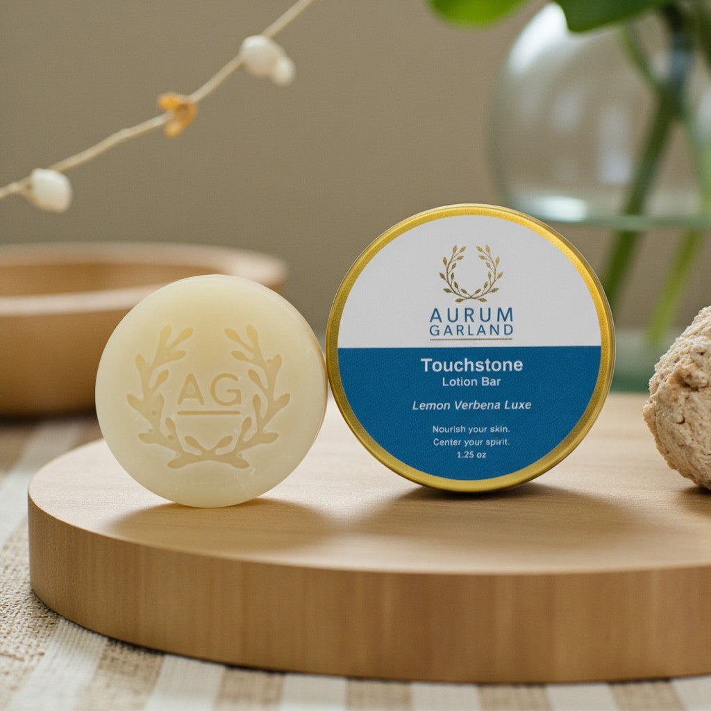 Aurum Garland soap bar and container on a wooden surface with a blurred background